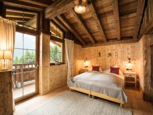 Łóżko lub łóżka w pokoju w obiekcie Gletscher-Chalet Stubai