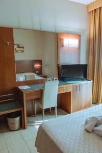 Postel nebo postele na pokoji v ubytování Hotel Amico + 37 fotografií