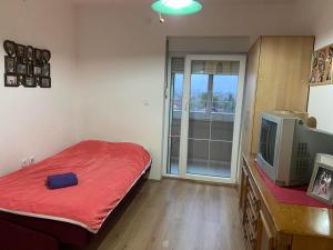 Postel nebo postele na pokoji v ubytování Apartman-Glavas