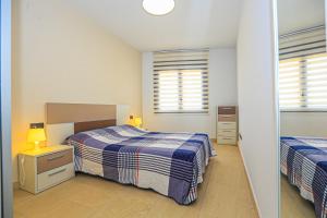 Ένα ή περισσότερα κρεβάτια σε δωμάτιο στο LITORAL COSTA DORADA - DI MARE Only families +40 φωτογραφίες