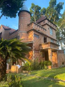Zahrada ubytování Finca con forma de castillo y piscina en Sopetrán + 21 fotografií