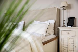 Postel nebo postele na pokoji v ubytování Hotel Zweite Heimat