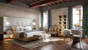Schlafzimmer mit einem Bett, einem Tisch und Stühlen in der Unterkunft Borgo Dei Conti Resort Relais & Chateaux in Monte Petriolo
