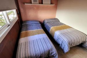 Posteľ alebo postele v izbe v ubytovaní Vintage & Deluxe Apartments