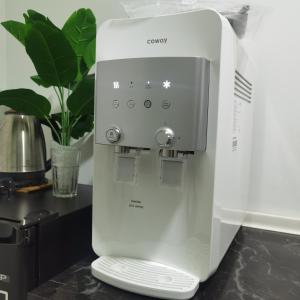 a white coffee machine sitting on a counter at NH Homestay Trefoil in Kuala Selangor