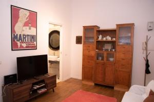 En TV eller et underholdningssystem på pantheon luxury apartment