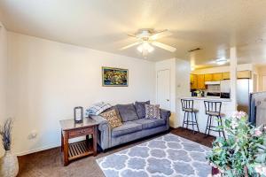 a living room with a couch and a table at Killeen Apartments, Multiple Units in Killeen