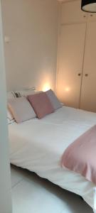 Cama o camas de una habitación en Appartement Dumortier