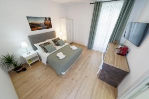 een slaapkamer met een bed bij Casa Ingenio - Exclusive Facility in Ingenio