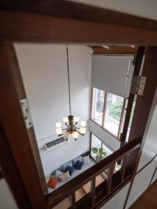 an overhead view of a room with a chandelier at Bedtime storeys near ICON SIAM in Bangkok