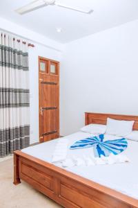 Postel nebo postele na pokoji v ubytování La Serene Resort