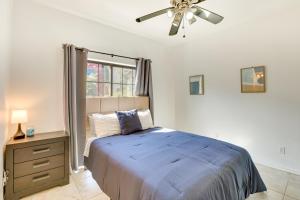 a bedroom with a bed and a ceiling fan at Rooftop Patio, Skyline Views Phoenix Townhome! in Phoenix +23 photos