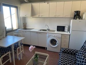 Kuchnia lub aneks kuchenny w obiekcie Edificio Laura