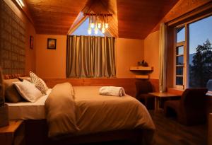 Postel nebo postele na pokoji v ubytování Flüstern Manali