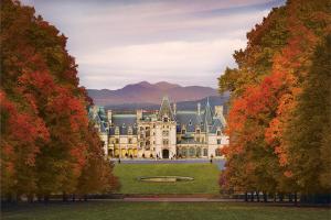 a castle in the middle of a park with trees at Nomad Retreat Pet-Friendly, Hot Tub & Mountain View in Old Fort