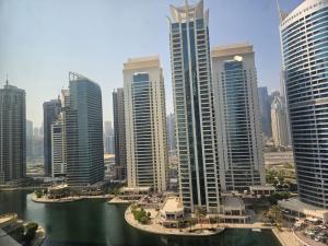 a city with tall buildings and a body of water at Lakeshore Towers, Cluster Y , JLT, 1BHK in Dubai