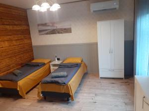 Postel nebo postele na pokoji v ubytování Rägavere tee 16 Apartment