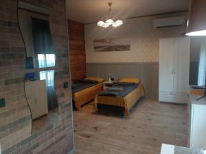 Postel nebo postele na pokoji v ubytování Rägavere tee 16 Apartment