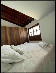 Postel nebo postele na pokoji v ubytování Casa colonial buragua