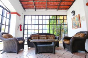 Uma área de estar em Hotel Hacienda Cancun