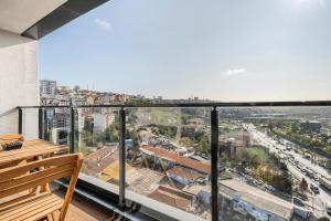 a balcony with a view of a city at Seba Suites with Fitness And Pool in Istanbul
