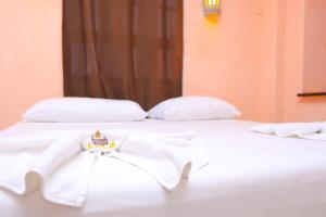 Cama ou camas em um quarto em Hotel Hacienda Cancun