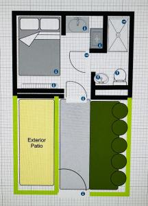 a drawing of a floor plan of a house at White Mermaid Cottage Anglesey Holidays in Newborough