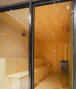 a room with a sauna with a wooden ceiling at GTC Luxury Top Floor Apartment, Nairobi in Nairobi