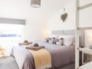 Postel nebo postele na pokoji v ubytování Sea Breeze