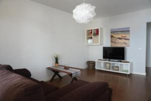 TV a/nebo společenská místnost v ubytování Modern House in Bajamar