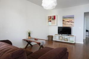 TV a/nebo společenská místnost v ubytování Modern House in Bajamar