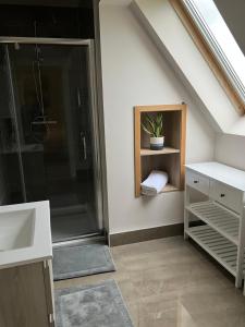 Postel nebo postele na pokoji v ubytování Oakwood B&B