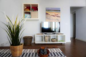 TV a/nebo společenská místnost v ubytování Modern House in Bajamar
