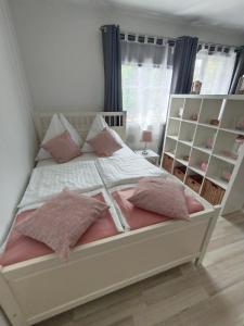 Ліжко або ліжка в номері Ferienwohnung Strohblume