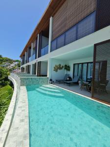 CairuにあるApartamento em Morro de São Paulo (BA)の家の前のプール