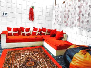 Posezení v ubytování Mannat Inn TS Mysore - Premium Homestay