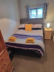 Postel nebo postele na pokoji v ubytování Closh Cottage