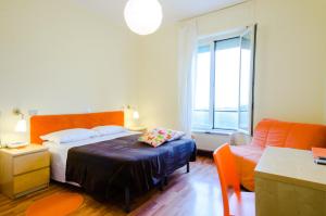 Postel nebo postele na pokoji v ubytování Albergo Villa Gaia