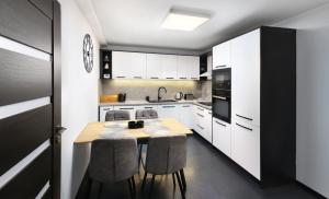 Kuchyň nebo kuchyňský kout v ubytování Luxus apartmán pod hradom