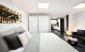 Posteľ alebo postele v izbe v ubytovaní Luxus apartmán pod hradom