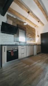 Kuchyň nebo kuchyňský kout v ubytování Casa Fonset