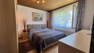 Postel nebo postele na pokoji v ubytování Alpenblick Loft neben Skilift in Amden Arvenbüel