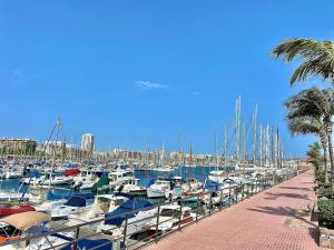 a bunch of boats docked in a marina at Las Brisas 2 by SunHousesCanarias in Las Palmas de Gran Canaria