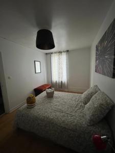 Posteľ alebo postele v izbe v ubytovaní Les Gites d'Albâtre, le 56