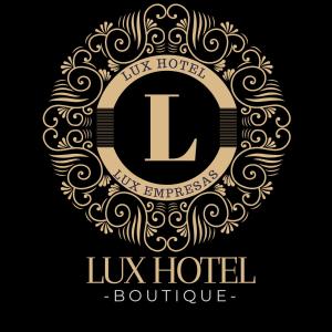 un logotipo de hotel de lujo dorado y negro con una letra l en LUX - HOTEL BOUTIQUE, en Andahuaylas