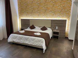Postel nebo postele na pokoji v ubytování B&B La Villa Cittanova