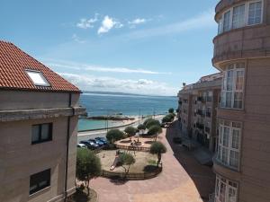 a view of the ocean from a building at Atico vistas mar in Ribeira