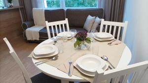Posezení v ubytování Apartament MAX + 18 fotografií
