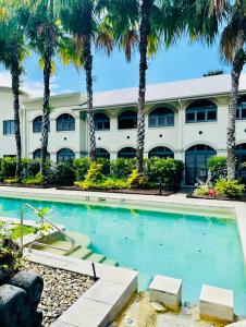 Bazén v ubytování Apartment in Palm Cove nebo v jeho okolí