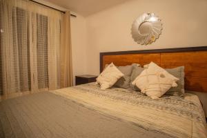 Postel nebo postele na pokoji v ubytování Parcela Almonte Piscina Temperada Hermosa Parcela